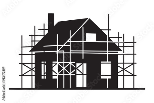 House under construction with scaffolding surrounding the building, black silhouette