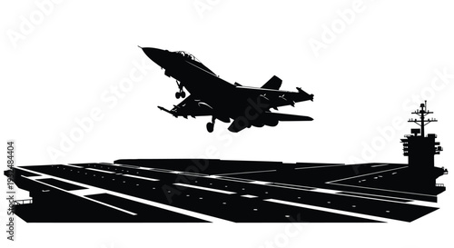 Military jet launching from aircraft carrier deck a striking silhouette