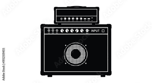 Black guitar amplifier stack with knobs and speaker a stark silhouette