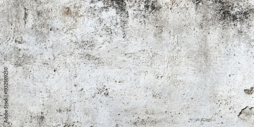 Aged gray concrete wall texture with a rough grunge surface and vintage cement pattern provides a blank stone backdrop for dirty industrial design