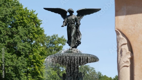 Photos New York City Central Park Bethesda Fountain, angel statue by Bethesda Terrace on summer day, United States