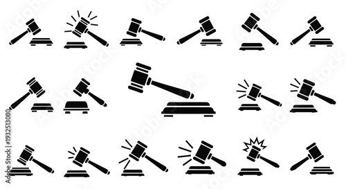 Multiple black judge gavels arranged in various positions a silhouette
