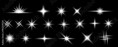 Collection of bright white starbursts and lens flares on a transparent background varying in shape