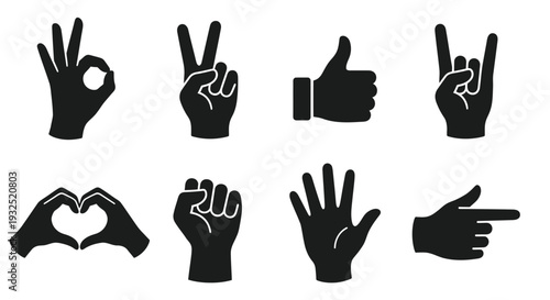 Collection of black silhouette hand gestures and symbols displayed on white