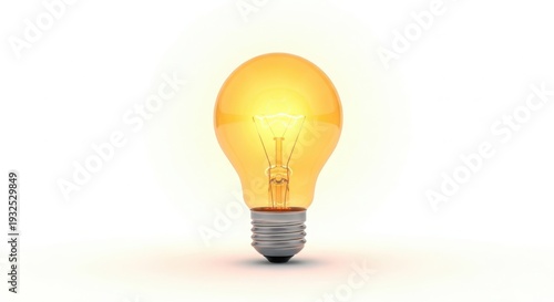 A glowing light bulb on a white background with a soft shadow underneath.