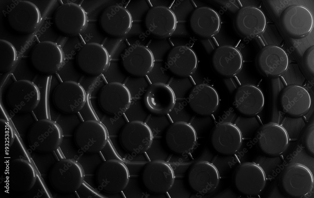 Obraz premium Abstract background with a smooth pattern of identical circles in grayscale