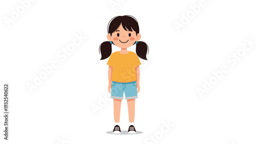 Cute little girl with black hair in pigtails wearing a yellow t-shirt and blue denim shorts standing against a white background.