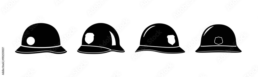 Fototapeta premium A collection of four distinct black helmets, each with unique design elements, arranged in a horizontal lineup
