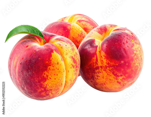 Three ripe peaches, glistening with water droplets, on black