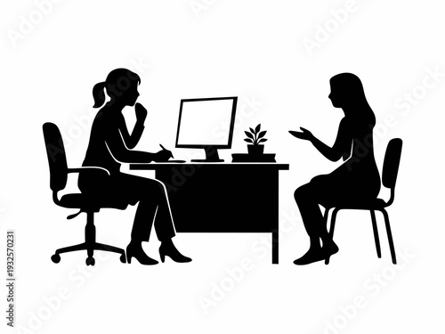 Business woman or psychologist consulting with a female client at desk silhouette