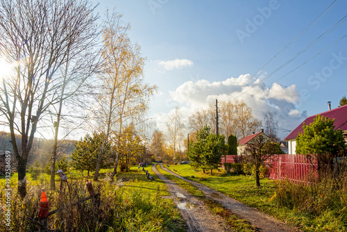 old wooden house in the village in autumn
