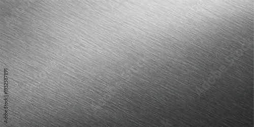 Polished metal surface with fine linear brushing and soft light reflections, a sleek metallic background for modern design.
