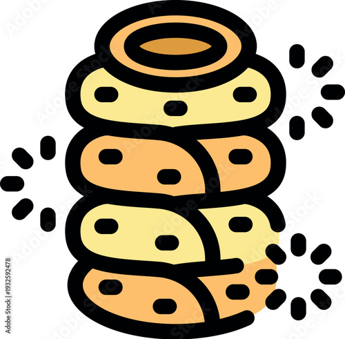 Sakotis or raguolis, baumkuchen spit cake, is dripping and rotating on a spit