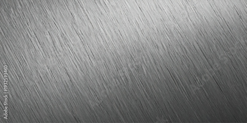 Close-up of brushed stainless steel surface with sharp diagonal striations, creating a textured metallic background effect.
