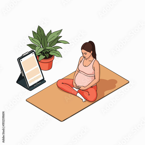 Pregnant woman meditating on yoga mat watching online class on tablet, healthy pregnancy lifestyle