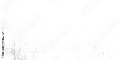 Faint grey pixelated texture overlay on white background