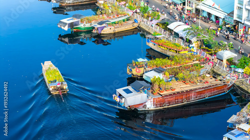 Wallpaper Mural Aerial view of floating flower market in Saigon or Ho Chi Minh City in Vietnam. The market on the Canal is open for the Tet Holiday or Lunar New Year Torontodigital.ca