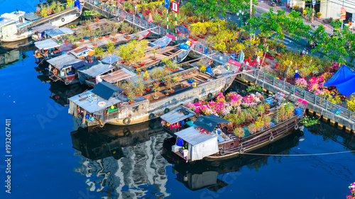 Wallpaper Mural Aerial view of floating flower market in Saigon or Ho Chi Minh City in Vietnam. The market on the Canal is open for the Tet Holiday or Lunar New Year Torontodigital.ca