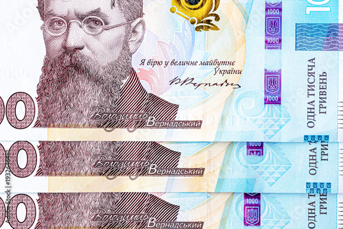 Ukrainian money, texture from Ukrainian banknotes in the denomination of one thousand hryvnias, the banknote depicts Vernadsky.Banknote of 1000 hryvnias of Ukraine, fragment of elements for design.