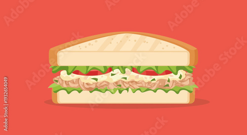 A delicious sandwich with lettuce, tomato, and filling on white bread.