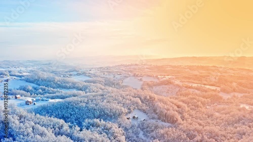 Winter sunrise over snowy countryside