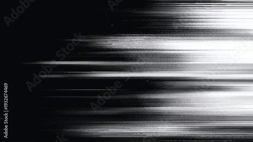 Blurry white light streaks on dark background