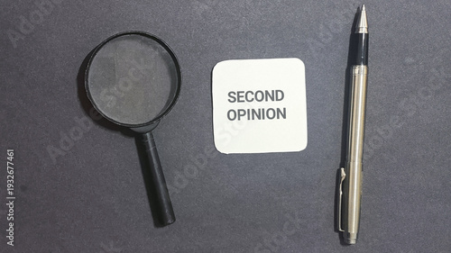 Magnifying glass and pen symbolizing the importance of seeking a second opinion and conducting thorough research