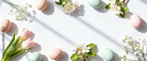 Pastel eggs and fresh spring blossoms create a beautiful, bright border design