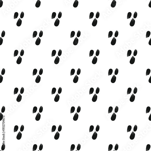 Wild boar animal foot tracks creating a repeating seamless pattern