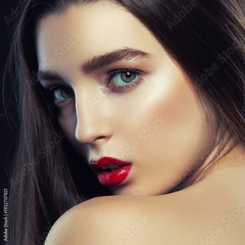 Beauty fashion portrait of caucasian brunette woman wet wet red lipstick