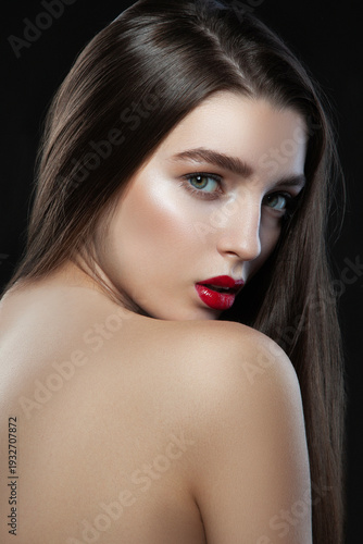 Beauty headshot of fashion model woman face with bright make-up and brunette hair style