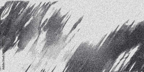 Dynamic grayscale abstract background with diagonal streaks and granular noise, evoking a sense of movement and energy for graphic design and artistic applications