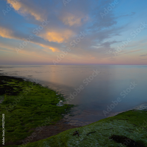 Sunset over Beadnell Bay Northumberland, England, UK.
