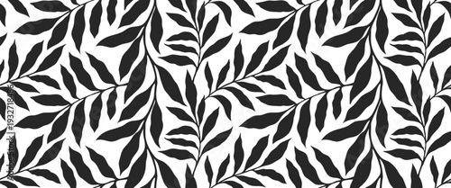 Seamless black and white leaf pattern with bold botanical silhouettes. Modern repeating foliage design creates a striking natural background. Perfect for fabric, wallpaper, packaging, and contemporary