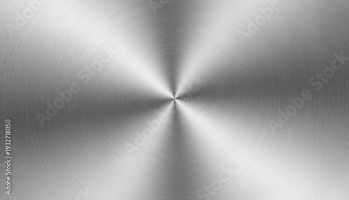Brushed metal texture background with circular pattern.