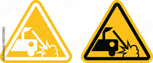 Warning signs indicating potential hazards from construction equipment and machinery.