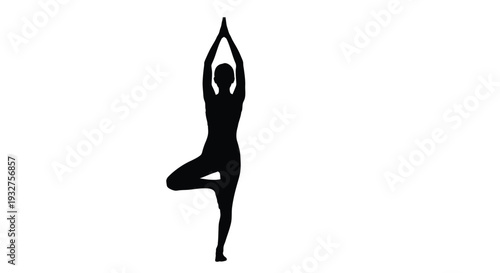 Silhouette of a woman performing the tree pose in yoga