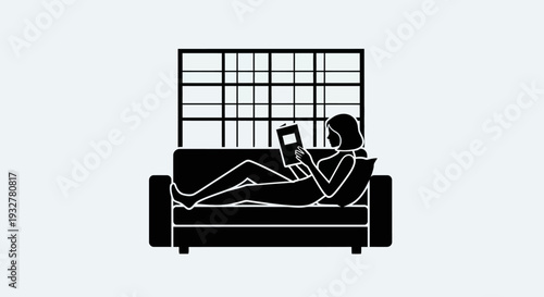 A woman relaxing on a couch with a tablet