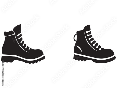 Black boots with white laces and soles  two hiking boots side by side on white background