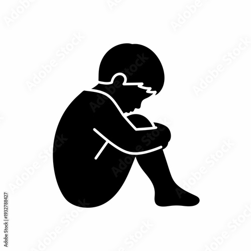 Sad Child Silhouette Sitting Alone.