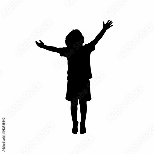 Silhouette of a young girl with arms outstretched.