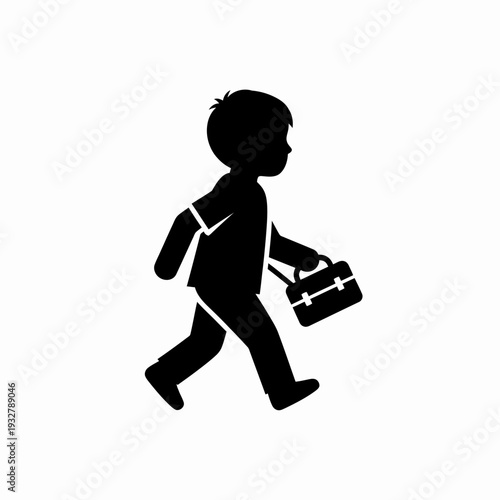 Silhouette of a Boy Walking with Lunchbox.