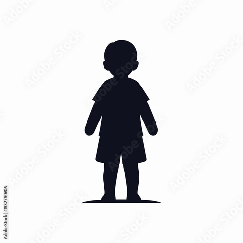 Silhouette of a young child standing.