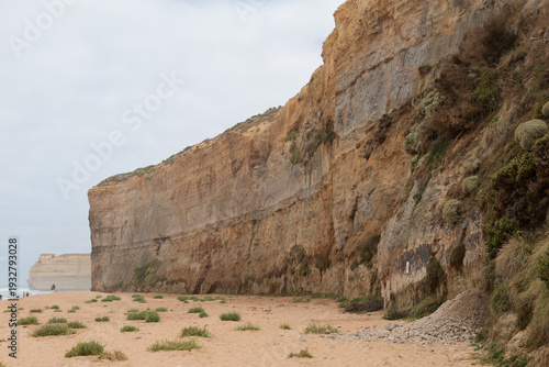 Massive limestone cliff face on the beach at Great Ocean Road Australia