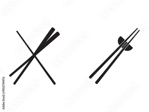 Chopsticks crossed and with spoon isolated on white background for food and dining utensils concepts