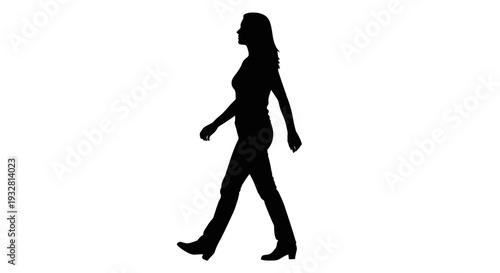 Silhouette of a walking woman.