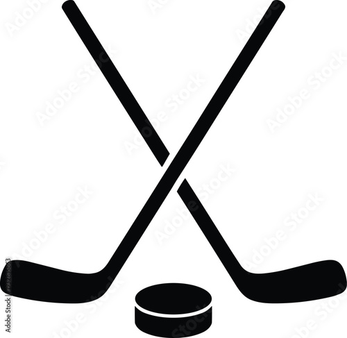 Crossed hockey sticks with puck black silhouette icon minimal flat vector illustration isolated on light background for sports logo and team branding