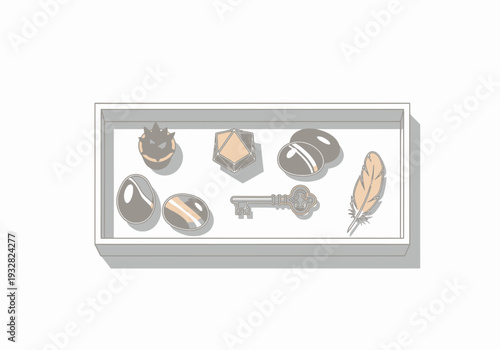 A collection of various objects displayed in a gray framed box viewed from a slightly angled perspective