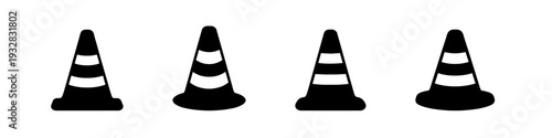 Four black traffic cones with white stripes arranged in a row on a white background