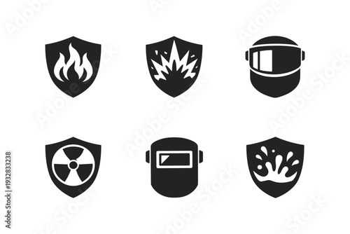 Collection of safety and protection icons on shields, representing different hazards and safety gear